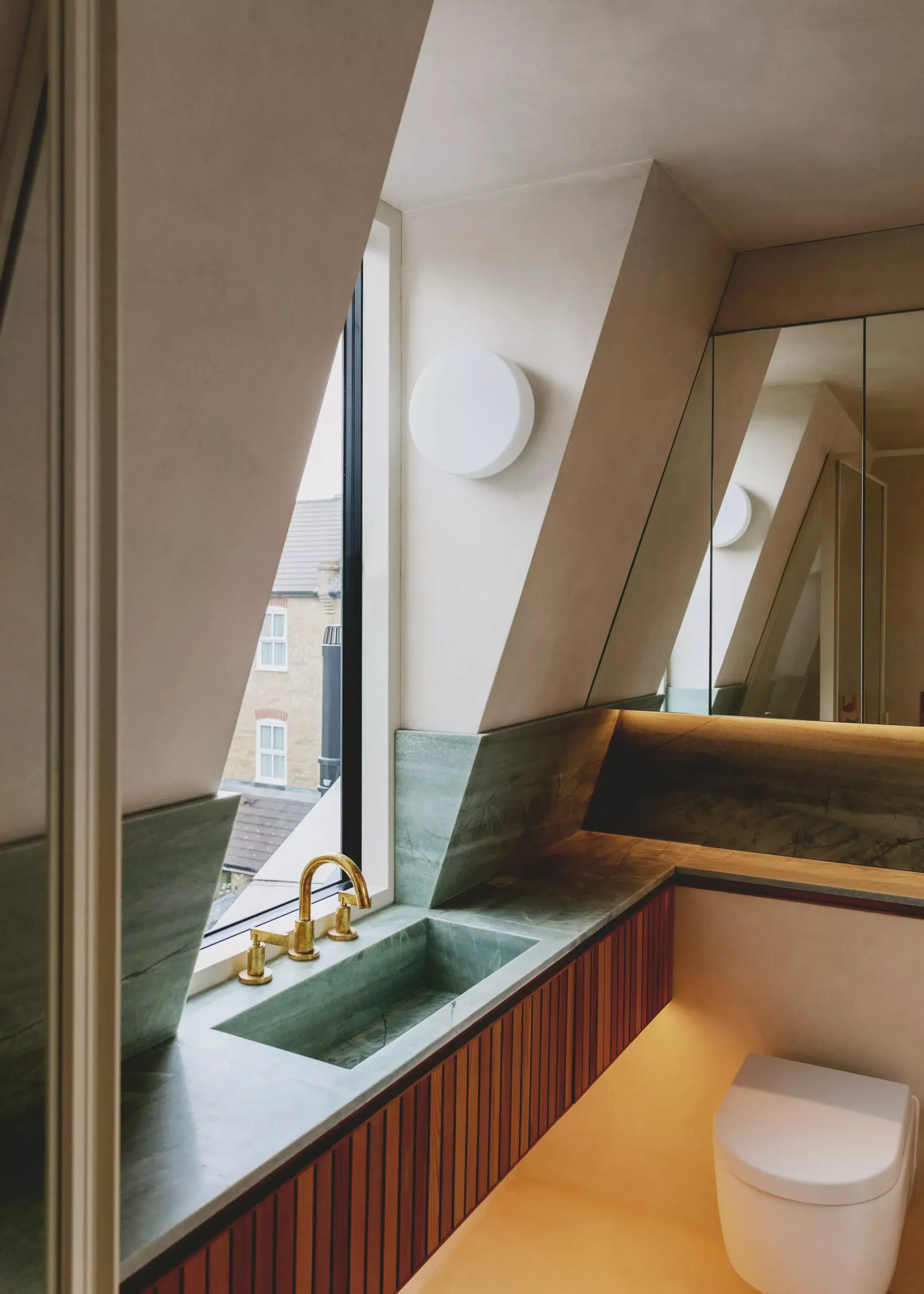 contemporary bathroom with green worktop